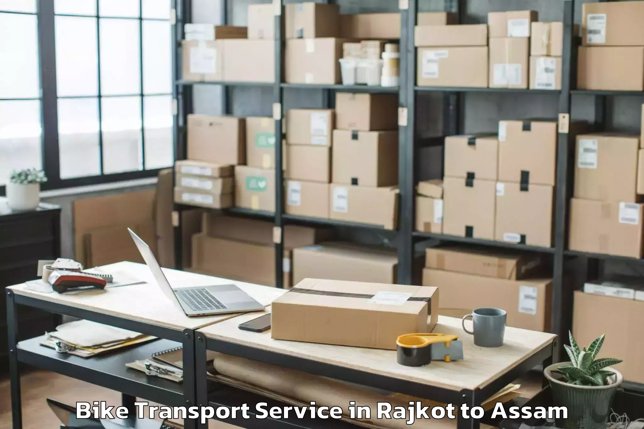 Leading Rajkot to Naharkatia Bike Transport Provider